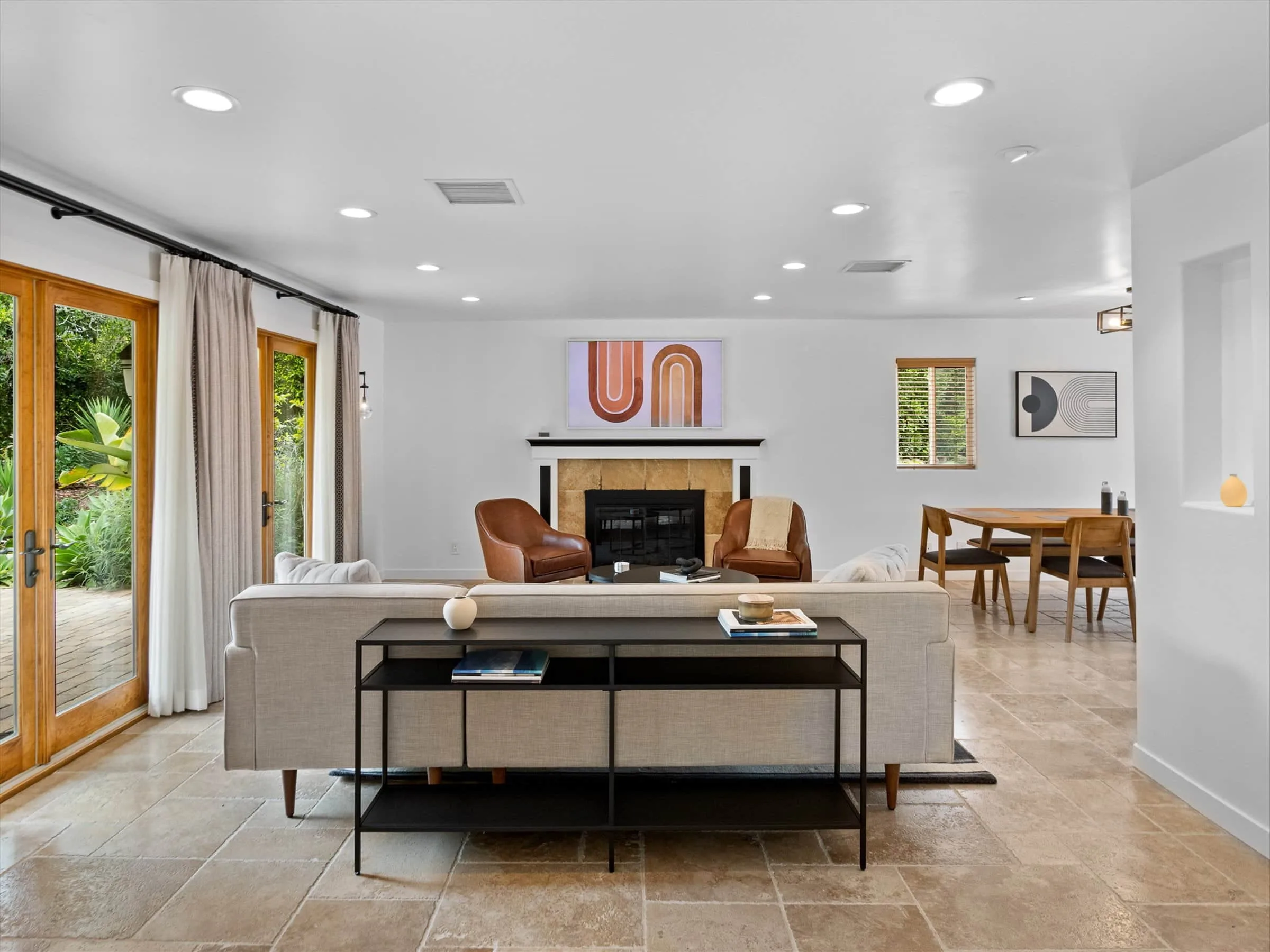 Bright Montecito living room with a fireplace and open floor plan