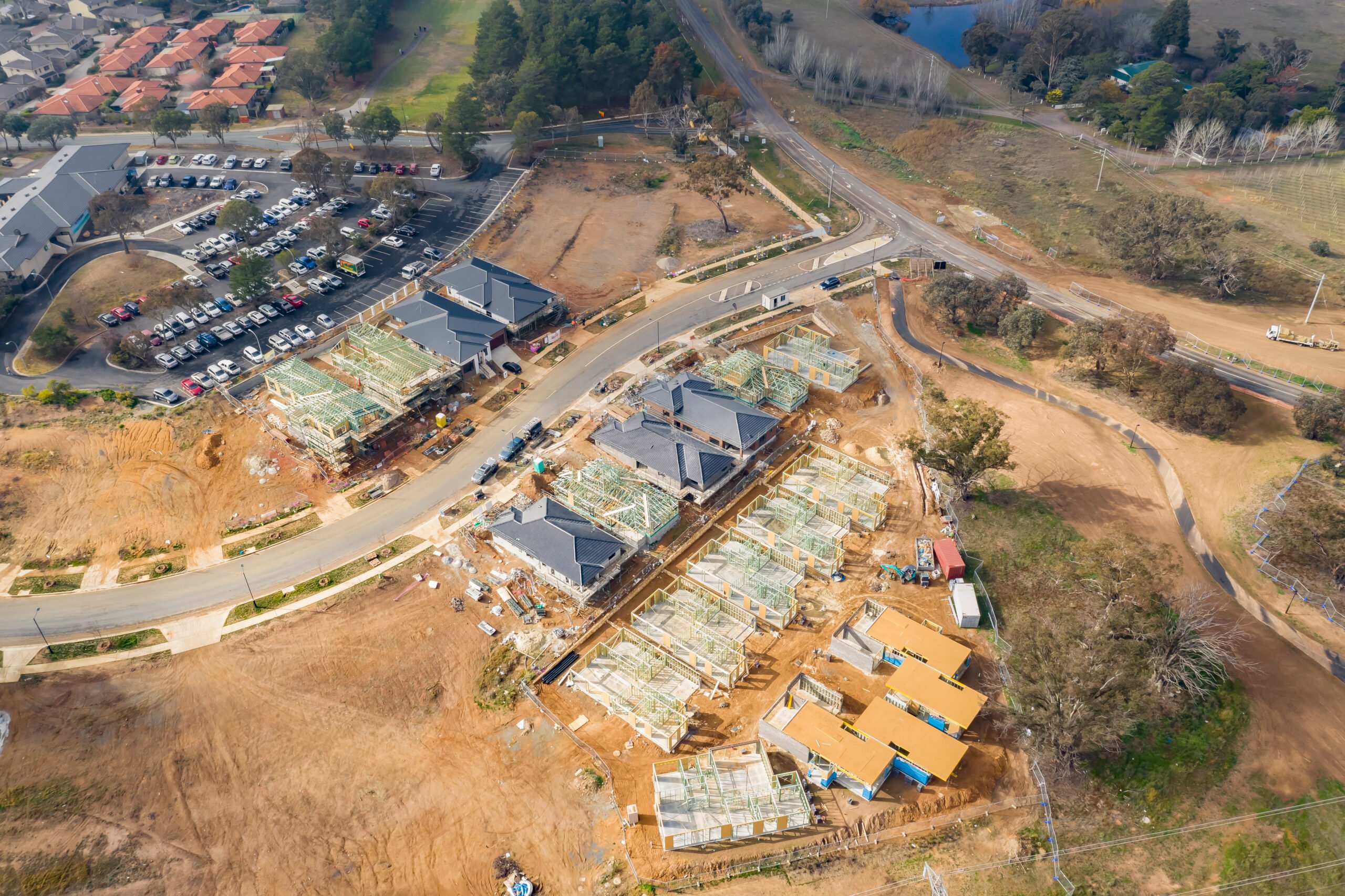Aerial view of housing development and construction in a newly established suburb